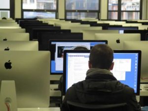 man in computer lab